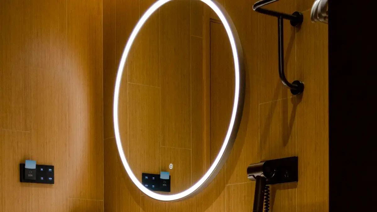 Why Is My Bathroom Mirror So Dark? Wall Lights and Task Fixtures That Fix Shadow Problems