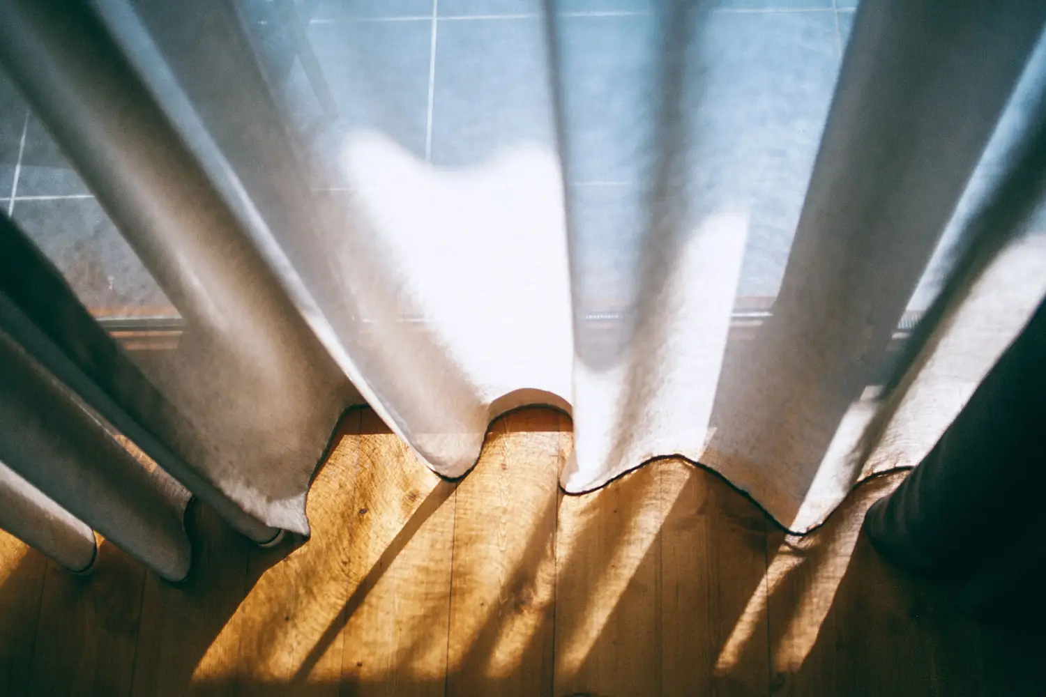Why 'Floor-Length' Curtains Should Float, Not Puddle
