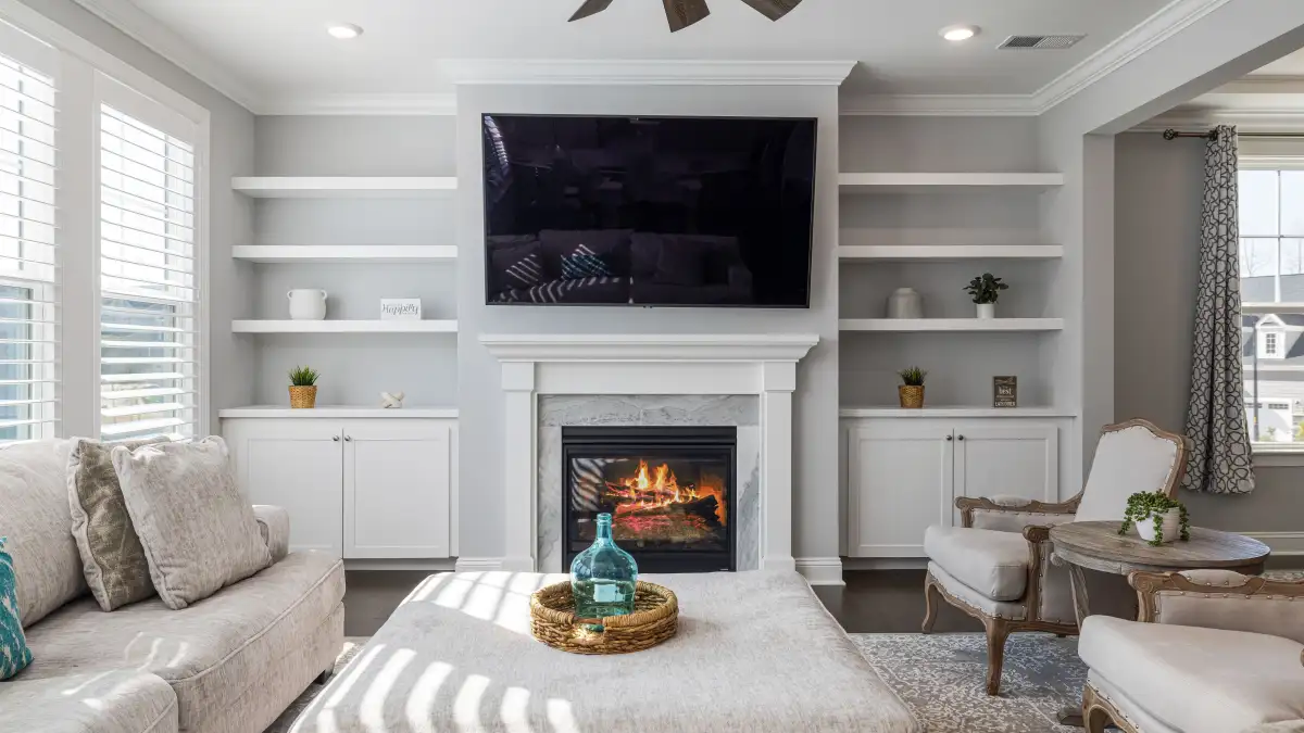 Where Should the Sofa Face When Fireplace and TV Compete?